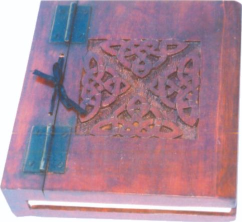 Wooden book with carved celtic design